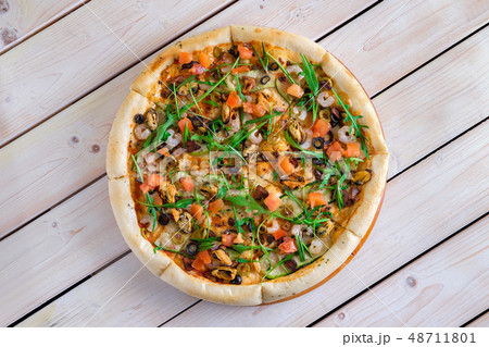 Pizza with shrimps, mussels and salmon 48711801