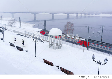 winter landscape with multiple-unit train 48712091