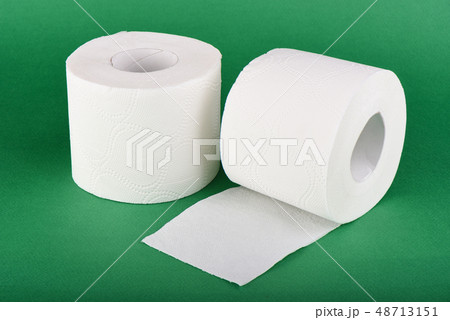 Two rolls of toilet paper isolated on green Two rolls of toilet paper isolated on green 48713151