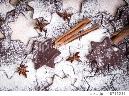 Cutting gingerbread cookies. Process of baking cookies at home. 48715251