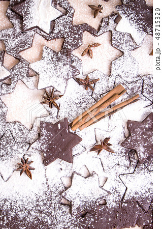 Cutting gingerbread cookies. Process of baking cookies at home. 48715329