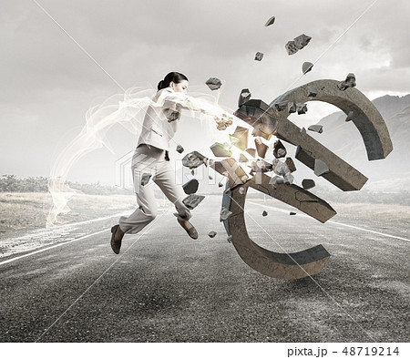 Woman attacking euro symbol 48719214