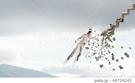 Man breaking ladder Man breaking ladder 48719243