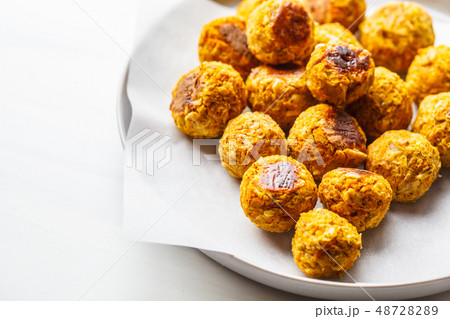Vegan bean meatballs on a white background. 48728289
