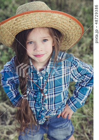 Portrait little girl Cowboy 48729386