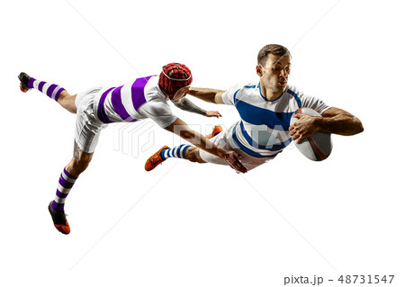 The silhouette of two caucasian rugby male players isolated on white background The silhouette of two caucasian rugby male players isolated on white background 48731547