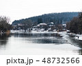 Houses in Winter Forest Near River 48732566