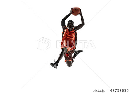 Full length portrait of a basketball player with ball 48733656
