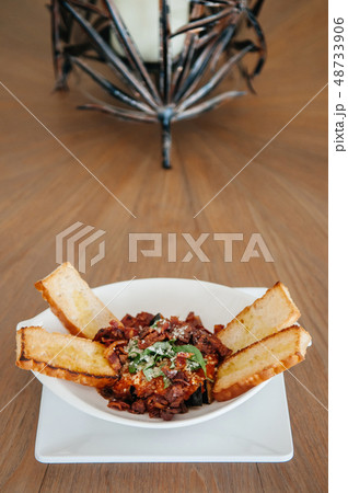 Baked eggplant Aubergine with crispy bacon and Baked eggplant Aubergine with crispy bacon and 48733906