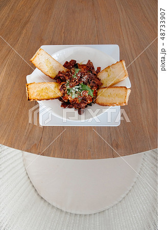 Baked eggplant Aubergine with crispy bacon and 48733907