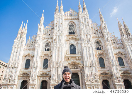 Winter travel, vacations and people concept - Handsome male tourist making selfie photo in front of 48736580