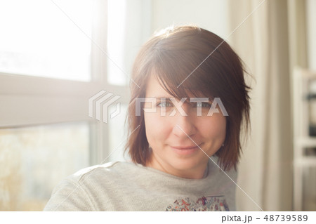 Caucasian girl with brown hair happy smiles. Caucasian girl with brown hair happy smiles. 48739589