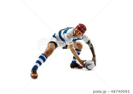 The silhouette of one caucasian rugby man player isolated on white background The silhouette of one caucasian rugby man player isolated on white background 48740093
