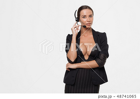 Lady with deep neckline and head microphone 48741065