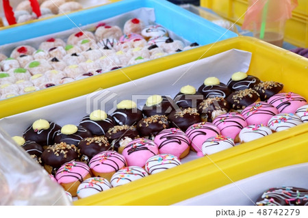 Sweet donuts at street food 48742279