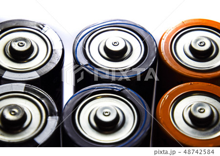 Salt and alkaline batteries, source of energy for portable technology. AAA and AA batteries 48742584