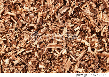 lots of brown wood saw dust 48742877