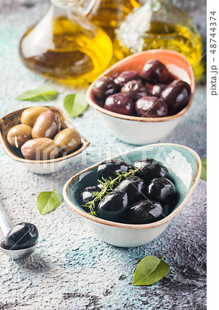 bowls with different kind of olives 48744374