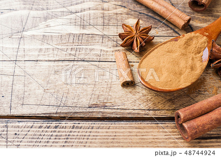 Fragrant spices cinnamon sticks and ground, star Fragrant spices cinnamon sticks and ground, star 48744924