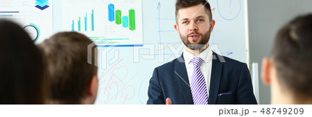 Young handsome teacher man in suit with Young handsome teacher man in suit with 48749209
