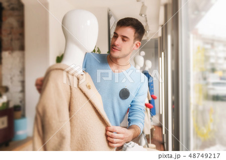 Young male dress on mannequin in clothing store. Young male dress on mannequin in clothing store. 48749217