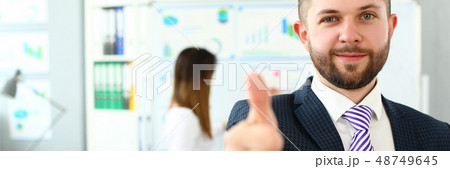 Male arm show OK or confirm during conference in office 48749645