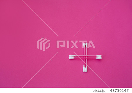 top view on four pink cotton buds with white heads top view on four pink cotton buds with white heads 48750147