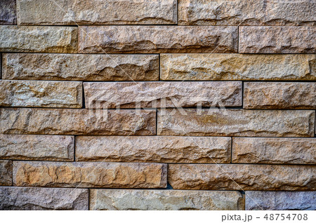 Old brown stone bricks wall pattern background of Old brown stone bricks wall pattern background of 48754708