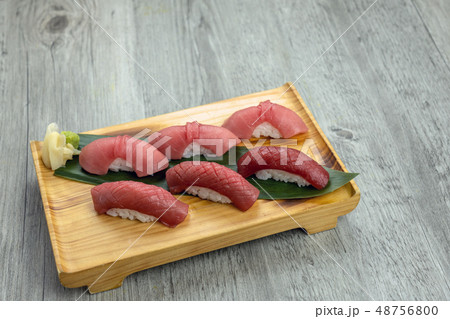chuoro and fatty akami tuna sushi set on the wooden table, healthy Japanese food concept chuoro and fatty akami tuna sushi set on the wooden table, healthy Japanese food concept 48756800