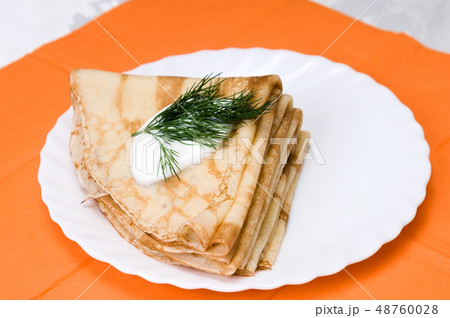 a stack of Russian pancakes a stack of Russian pancakes 48760028