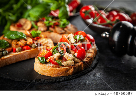 Traditional Italian bruschettas 48760697