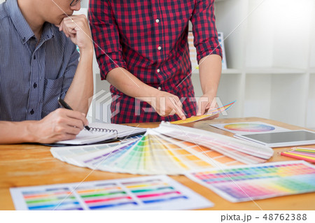 team Web designer working drawing something on graphic computer 48762388