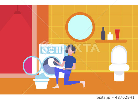 woman putting dirty clothes in washing machine housewife doing housework laundry room interior woman putting dirty clothes in washing machine housewife doing housework laundry room interior 48762941