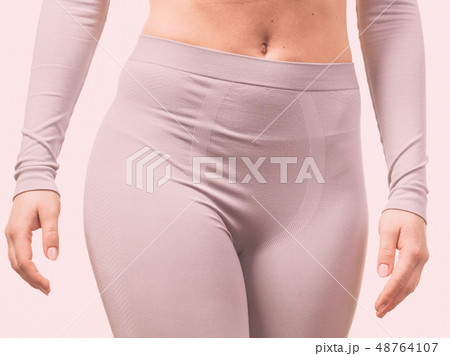 female hips wearing thermoactive underwear 48764107