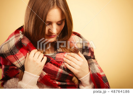 Woman wearing woolen checked scarf warm autumn clothing 48764186