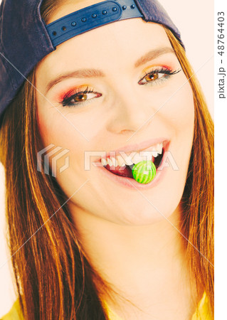 Girl with chewing gum. Girl with chewing gum. 48764403