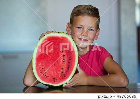 Cute kid enjoy summer juicy berry fruit watermelon 48765639