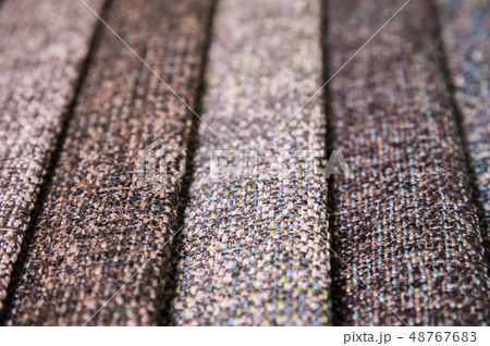 A set of samples of fabric furniture decoration lines of textile textures. Multicolored stripes 48767683