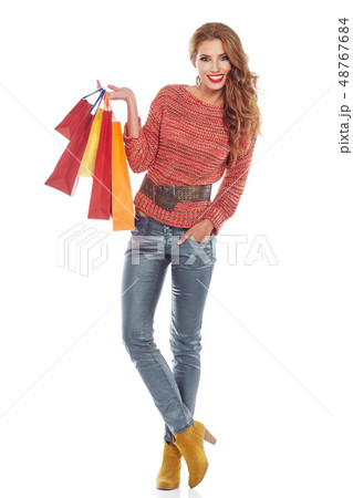 Woman and autumn shopping 48767684