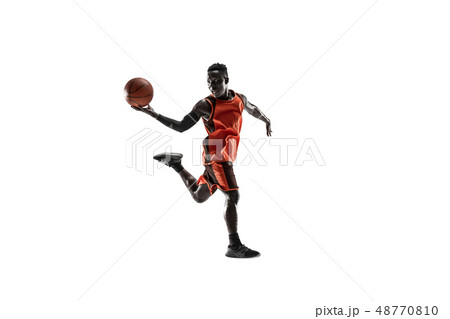 Full length portrait of a basketball player with ball Full length portrait of a basketball player with ball 48770810