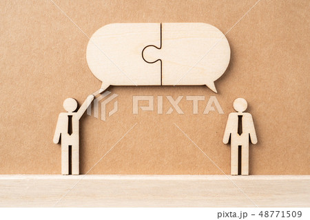 wooden businessman with conversation concept wooden businessman with conversation concept 48771509