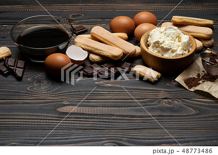 Ingredients for cooking tiramisu - Savoiardi biscuit cookies, mascarpone, cream, sugar, cocoa 48773486