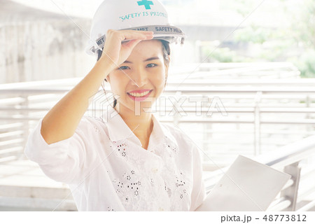 Engineer woman wear helmet safty 48773812