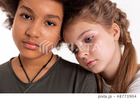 Pretty young kids having their freckles painted on 48773904