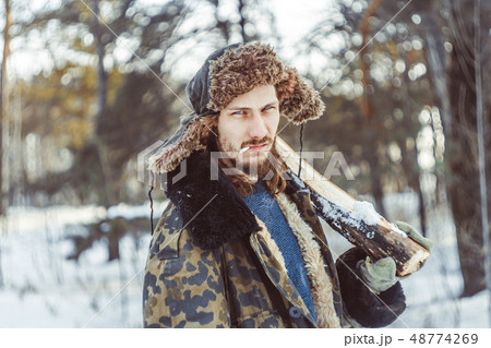 the man in the hat with earflaps 48774269