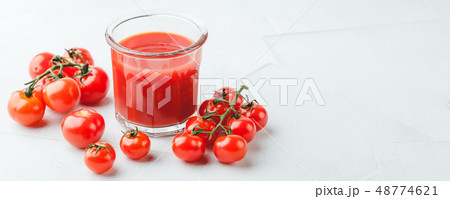 Glass of fresh organic tomato juice Glass of fresh organic tomato juice 48774621