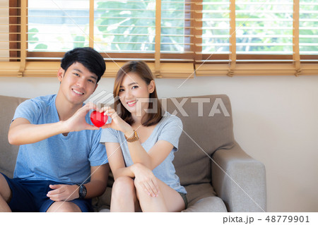 Beautiful portrait asian couple gesture heart Beautiful portrait asian couple gesture heart 48779901
