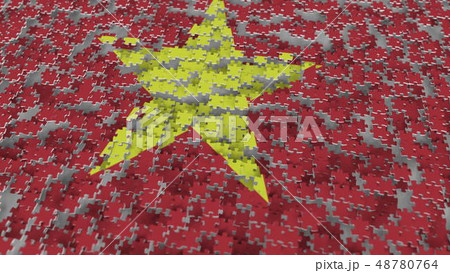 Flag of Vietnam being made with jigsaw puzzle pieces. Vietnamese problem solution conceptual 3D 48780764