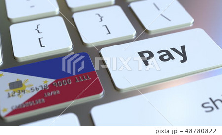 Bank card featuring flag of Philippines as a key on a computer keyboard. Online payment conceptual 48780822