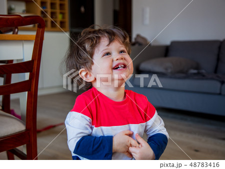 little todler boy stay at kitchen in a day  48783416